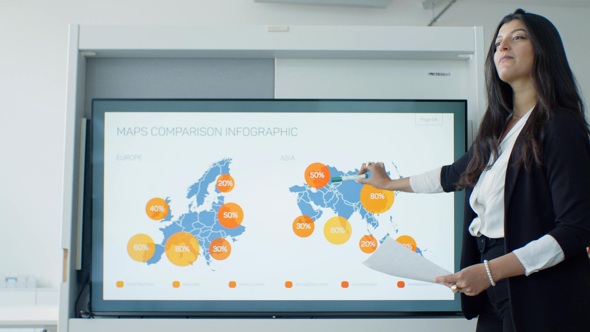 professional woman explains map comparison infographic in modern office setting. 8463140