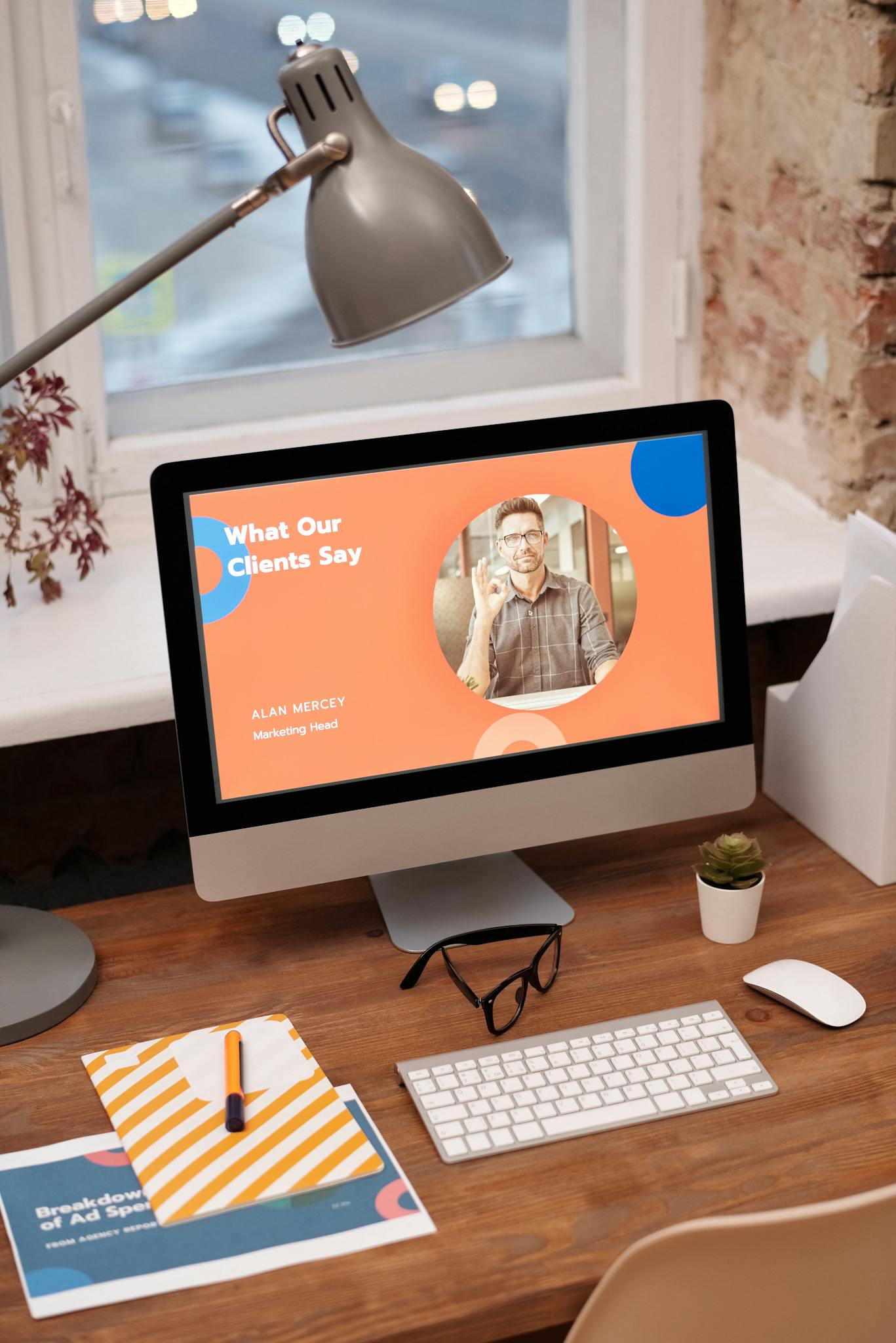 stylish home office setup with computer showcasing client testimonials. 6476595